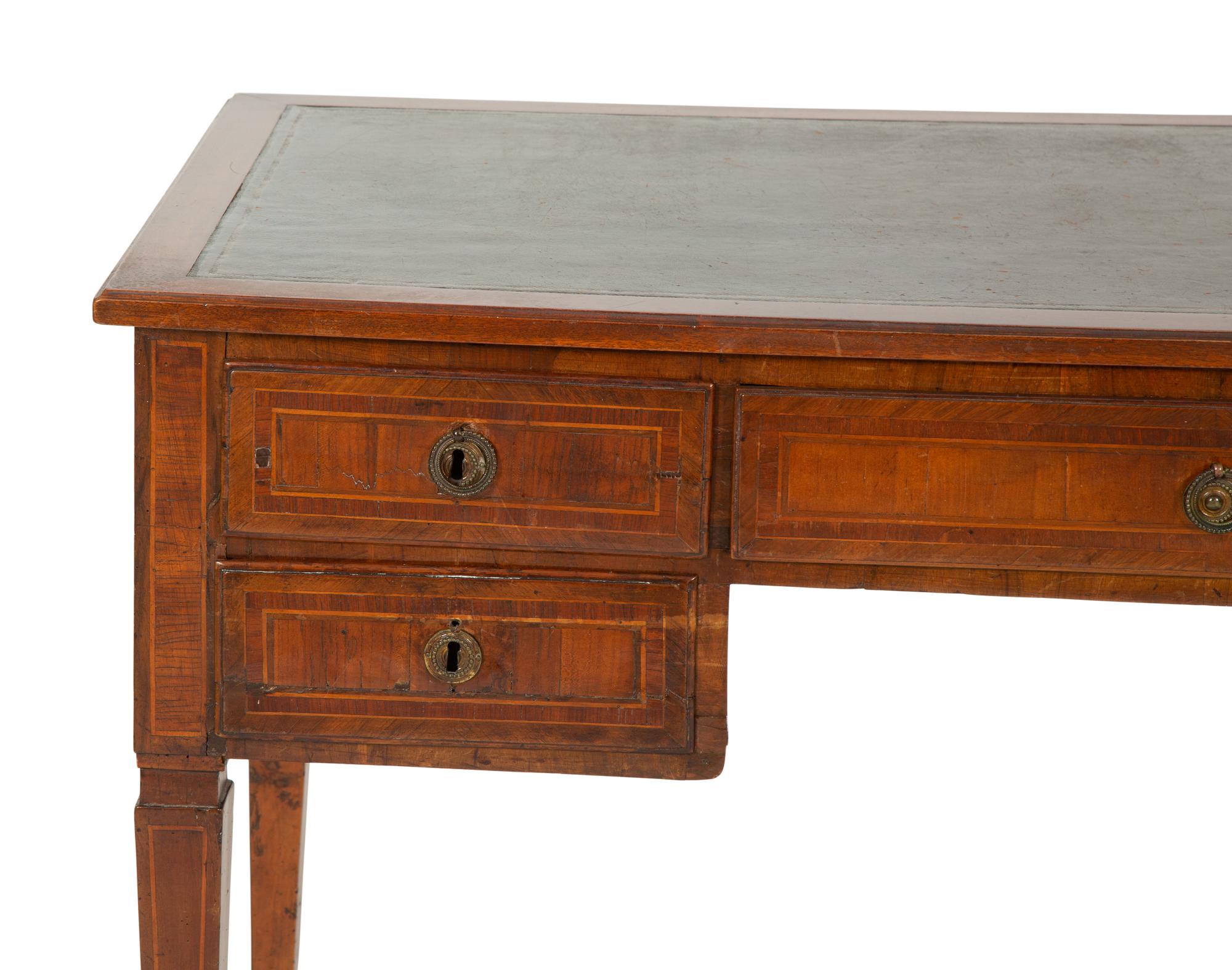 A Louis Phillippe Fruitwood Writing Table with Inset Green Leather Top
