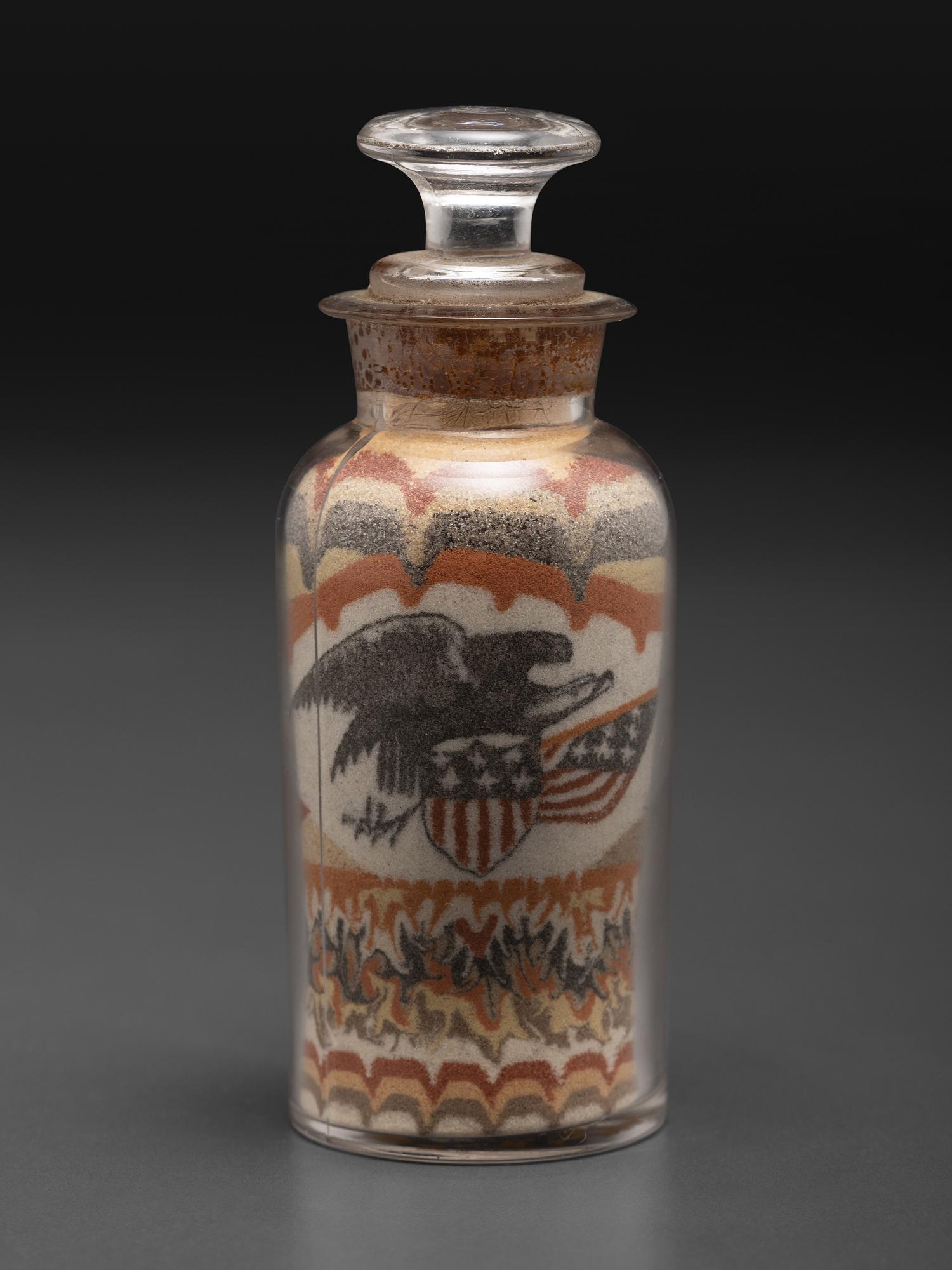 An Early Andrew Clemens (American, 1857-1894) Eagle Sand Bottle