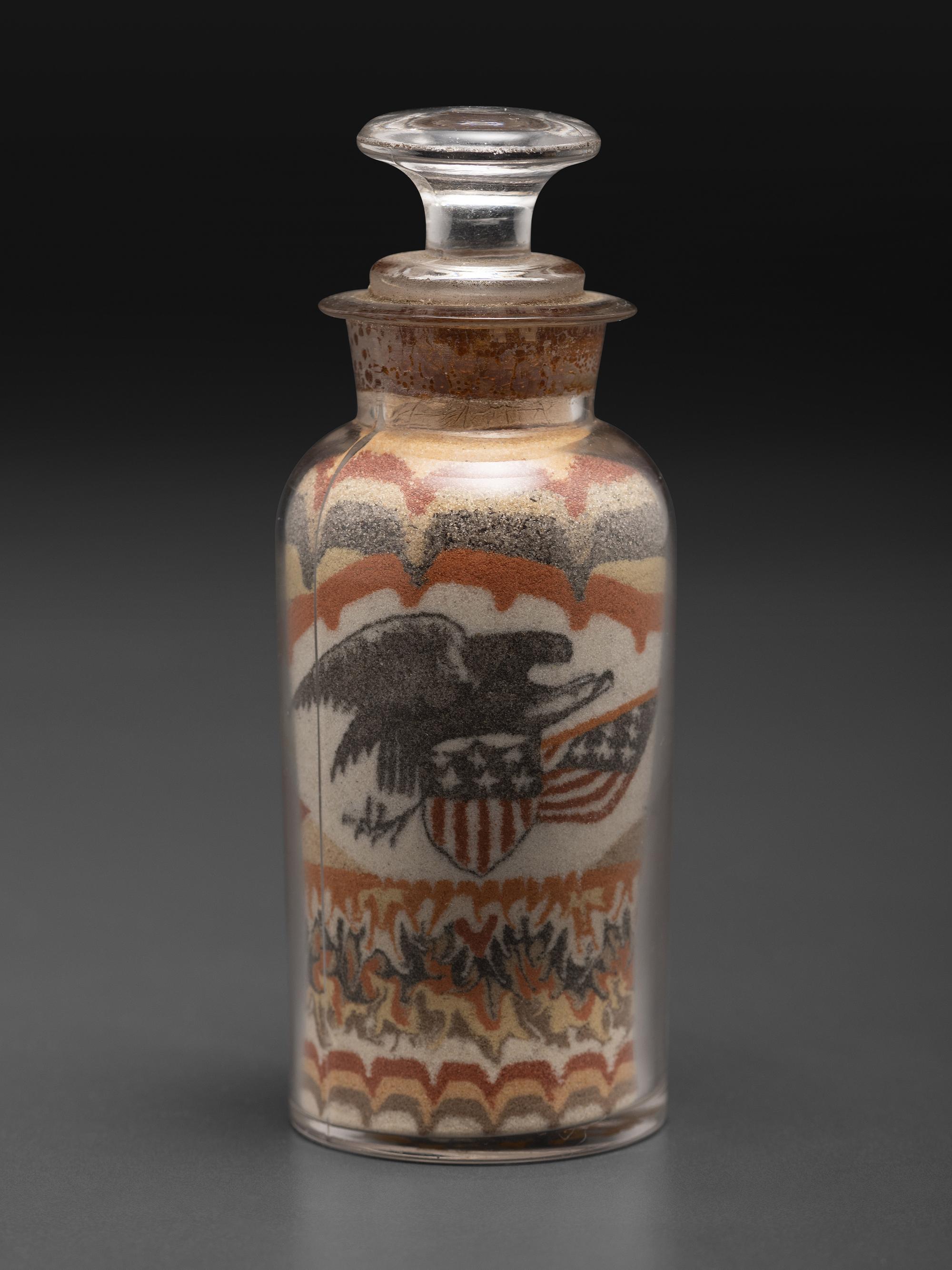An Early Andrew Clemens (American, 1857-1894) Eagle Sand Bottle