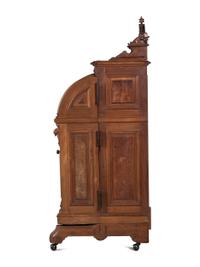 A Renaissance Revival Carved and Burl Walnut Wooton Desk