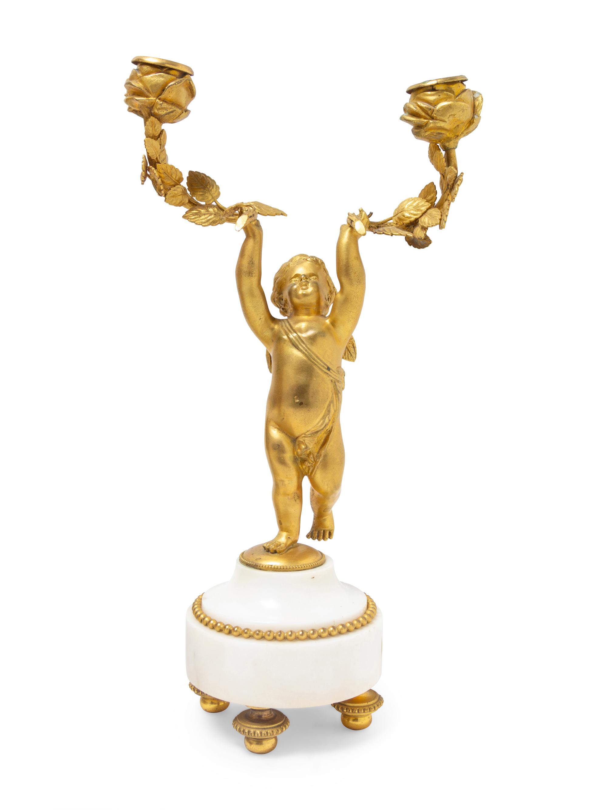 A Louis XVI Gilt Bronze and Marble Three-Piece Clock Garniture