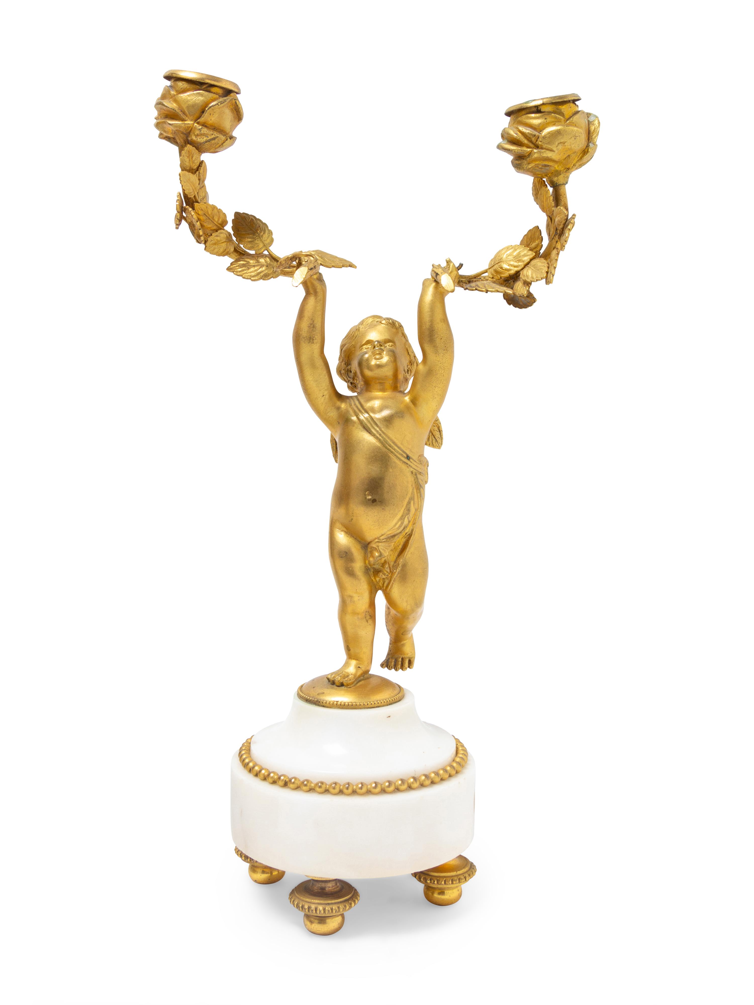A Louis XVI Gilt Bronze and Marble Three-Piece Clock Garniture