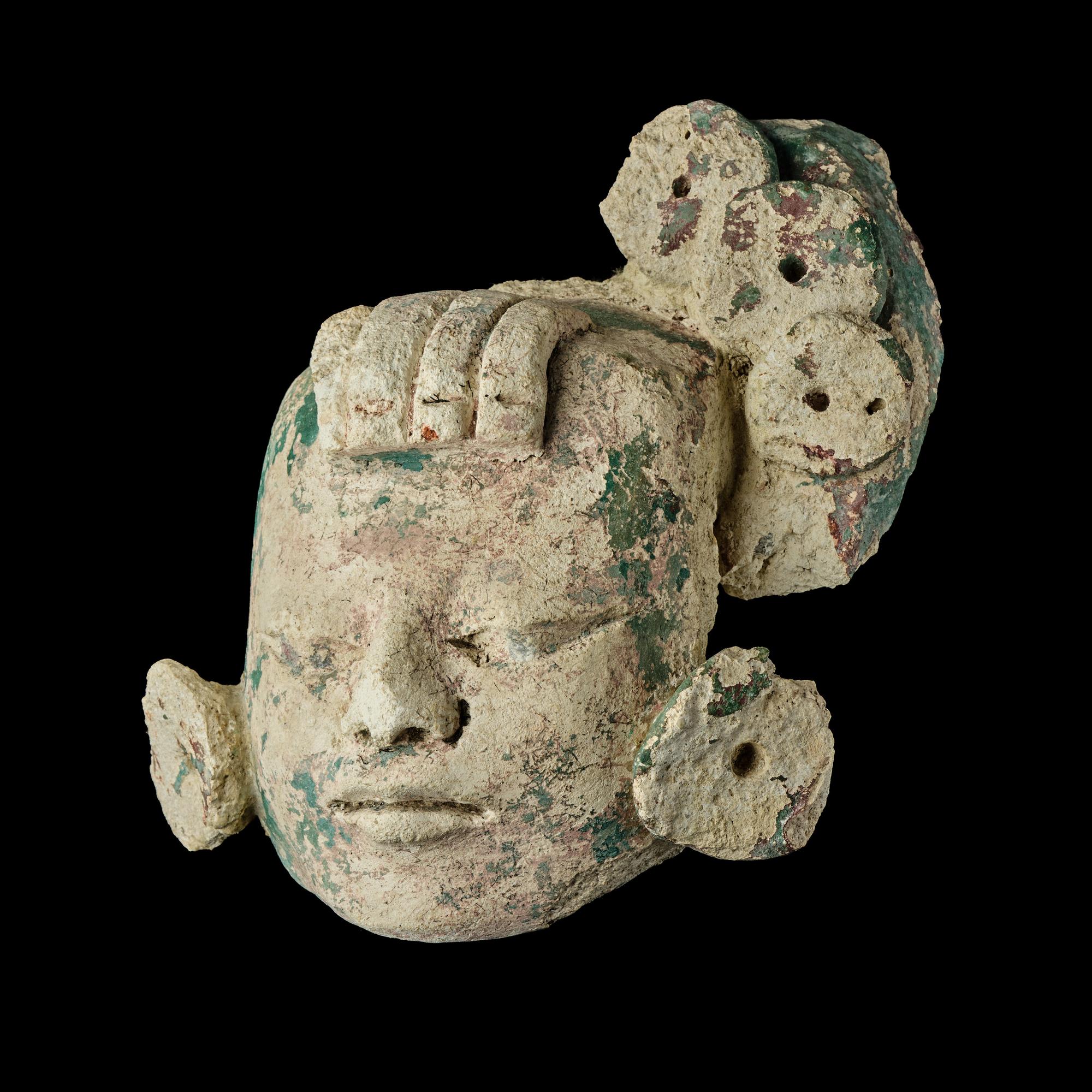 A Maya Stucco Head of a Dignitary