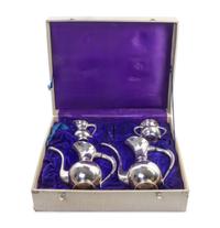 A Japanese Export Silver Four-Piece Tea and Coffee Service, 20th Century, comprising a teapot, a coffee pot, a creamer and a two-handle