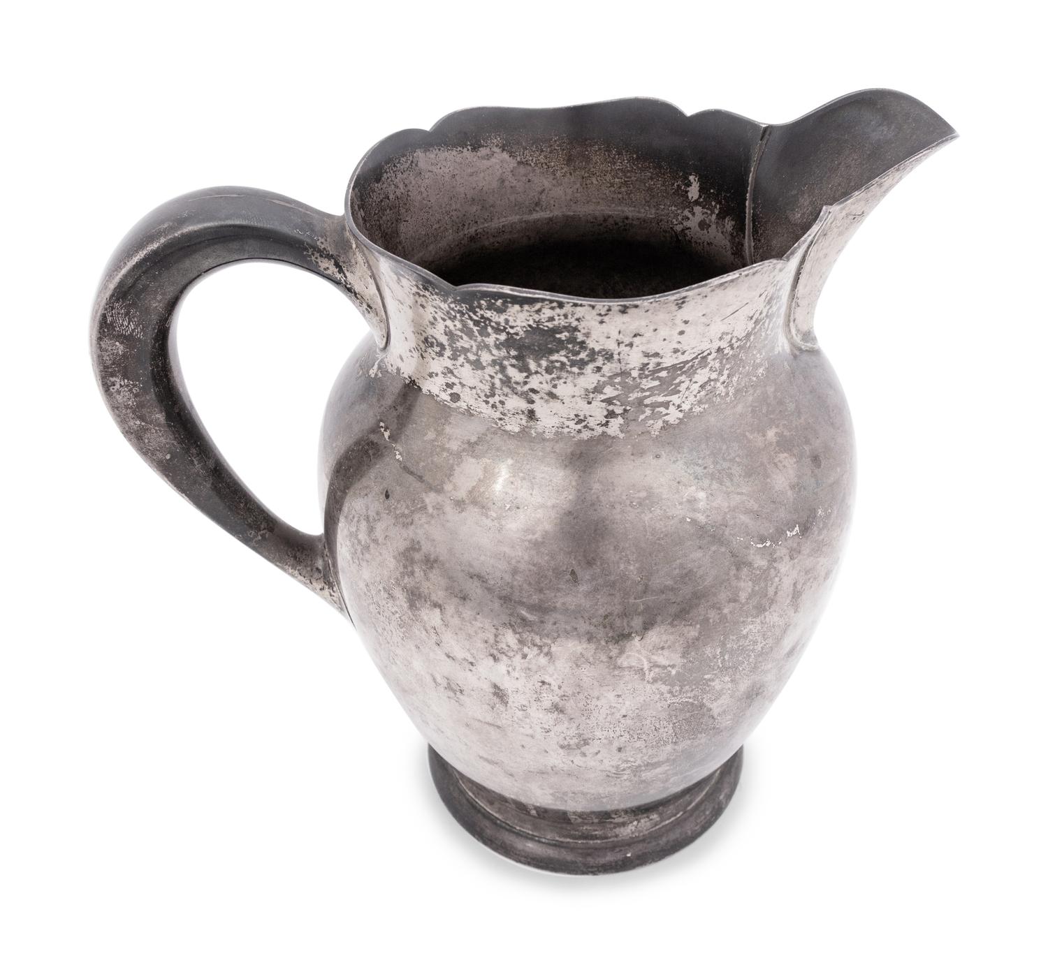 A Kirk and Sons Silver P resentation Pitcher