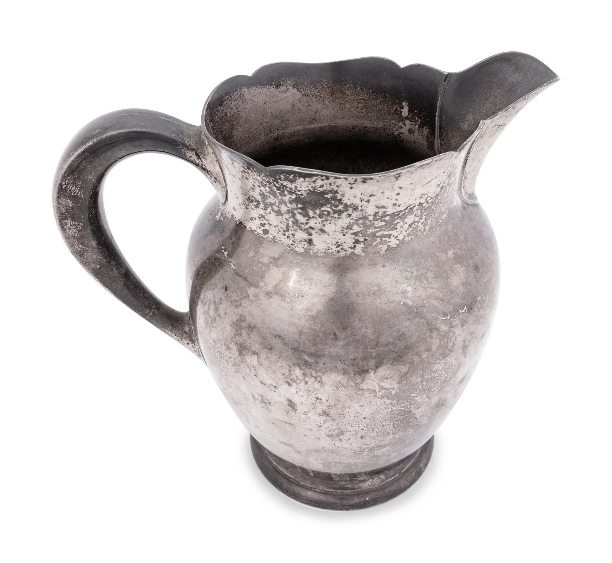 A Kirk and Sons Silver P resentation Pitcher