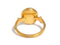 A Roman Onyx Cameo Ring Stone with the Head of a Child — Set in a gold ring