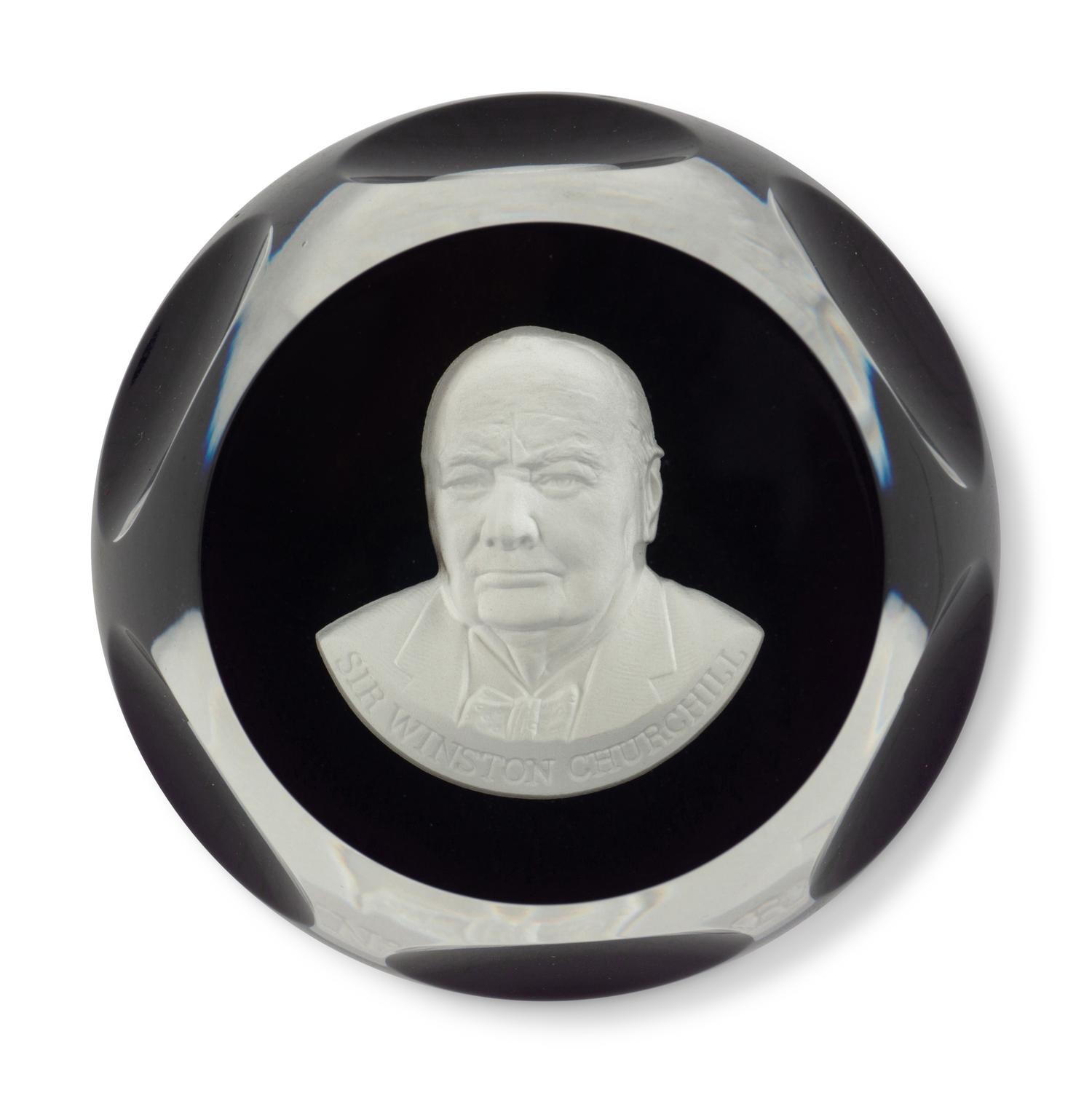 A Group of Seven Baccarat Paperweights