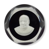 A Group of Seven Baccarat Paperweights