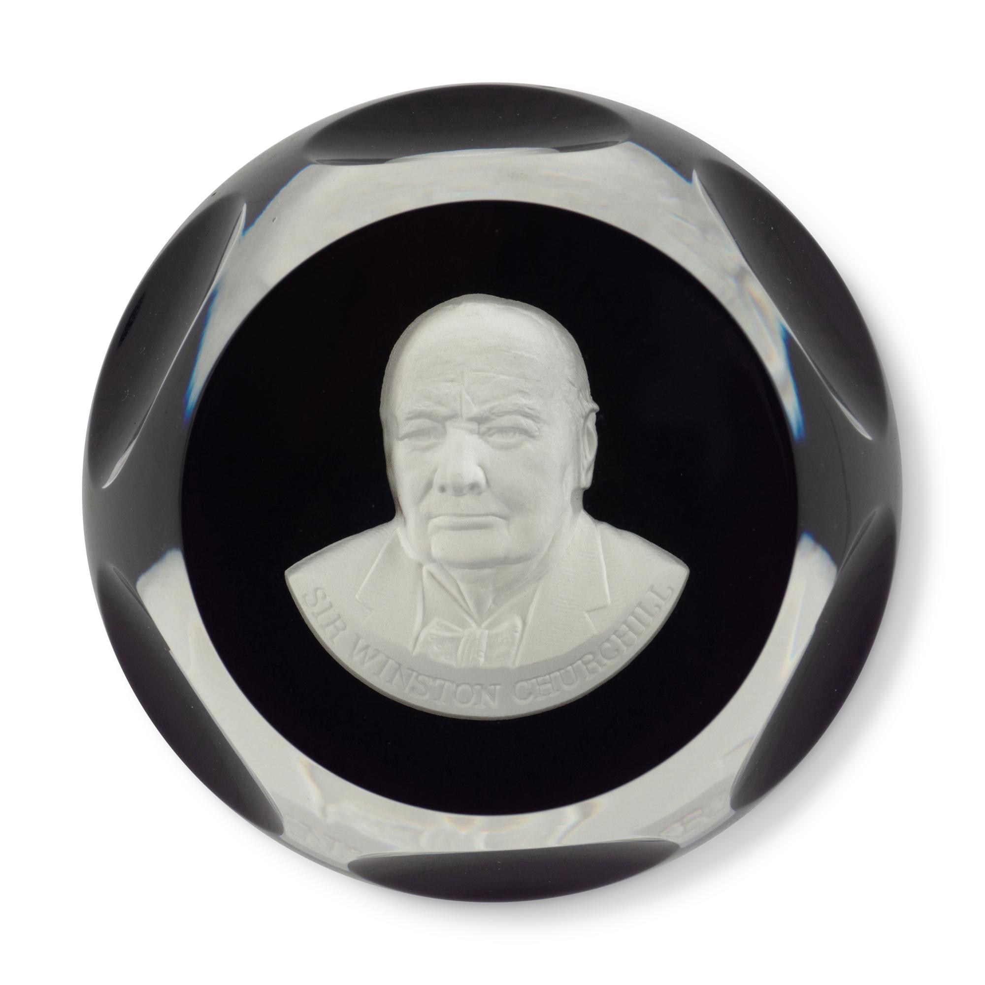 A Group of Seven Baccarat Paperweights