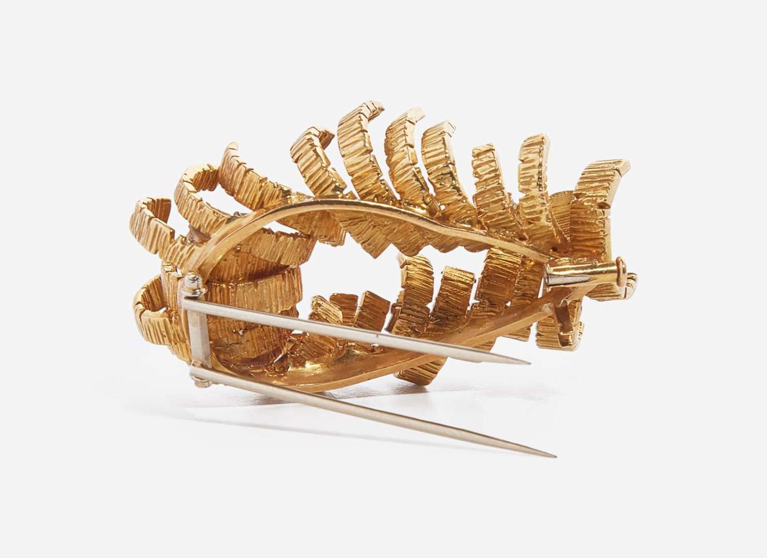 An 18K Yellow Gold and Diamond Brooch