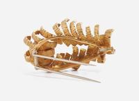 An 18K Yellow Gold and Diamond Brooch