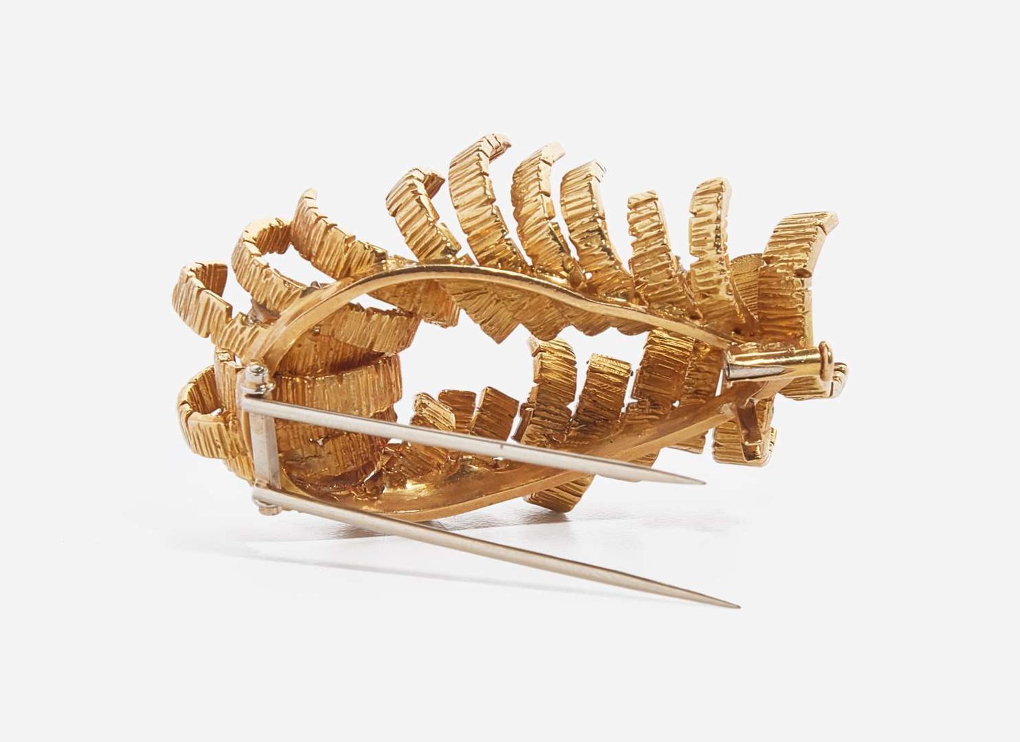 An 18K Yellow Gold and Diamond Brooch