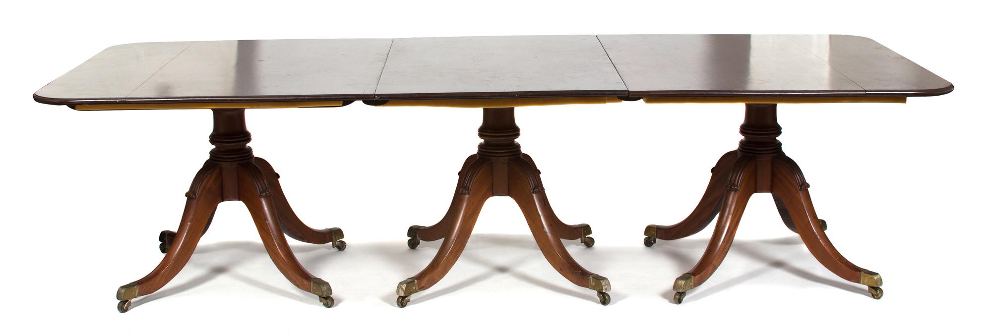 A Regency Style Double Pedestal Dining Table Height 28 x width (open) 107 x depth 48 inches. — LATE 19TH/20TH CENTURY
