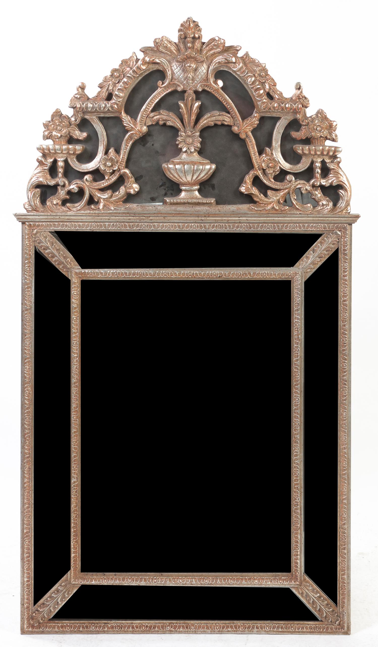 A Neoclassical Silvered Pier Mirror, Height 58 x width 32 1/2 inches.