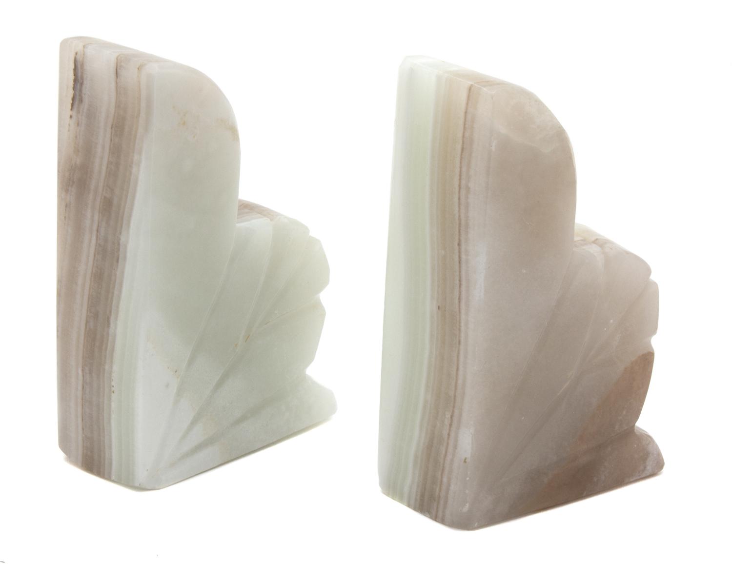 A Pair of Art Deco Carved Hardstone Bookends Height 4 3/4 inches. — 20TH CENTURY