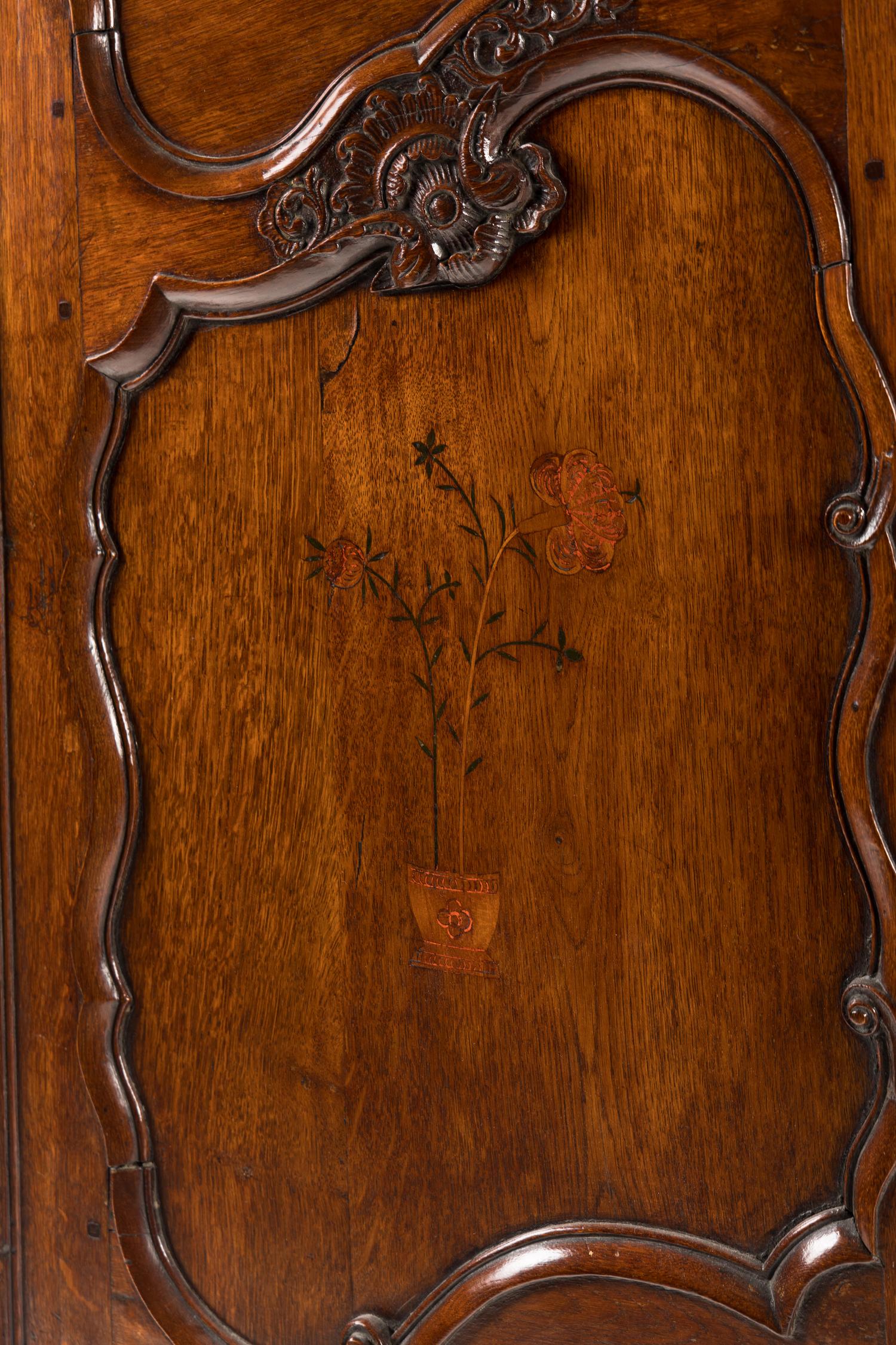 A Louis XV Walnut and Mulberry Marquetry Armoire