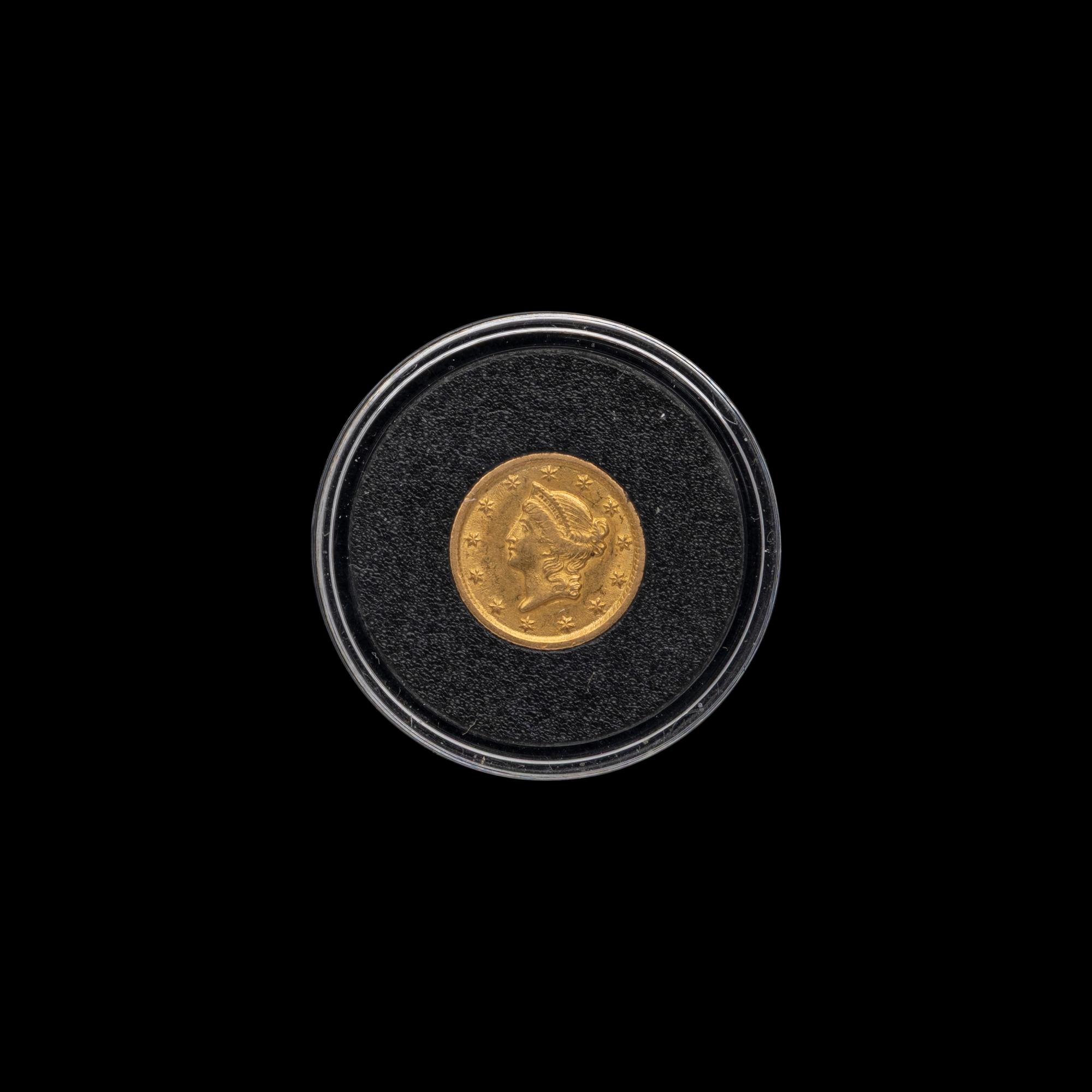An 1853-O Liberty Head $1 Gold Coin