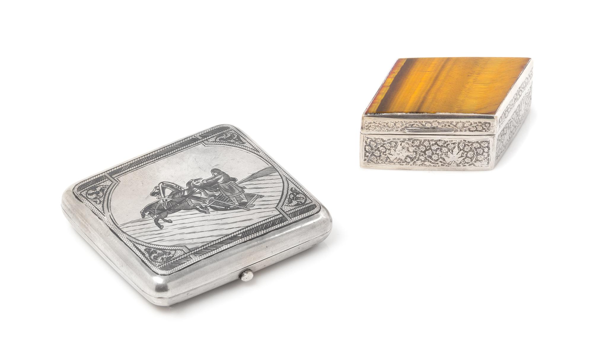 A Russian Niello Silver Cigarette Case, Mark of Alexander Yegarov, Assay of Lev Oleks, Moscow, 1895, the lid worked to show a man drivi