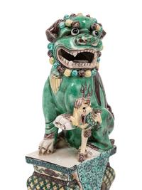 A Pair of Chinese Famille Verte Porcelain Figures of Fu Lions