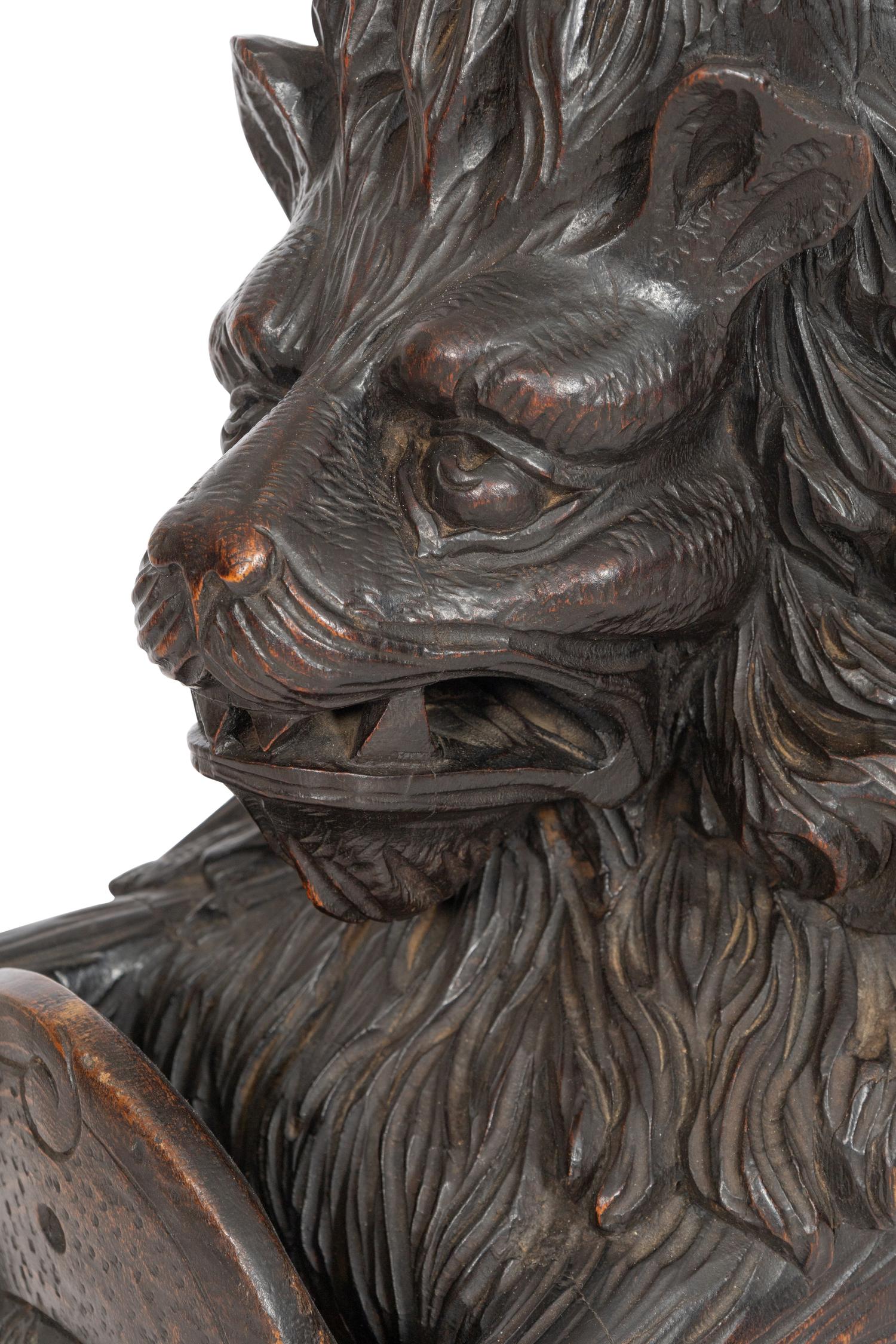 A Carved Oak Figural Newel Post