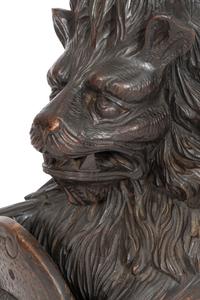 A Carved Oak Figural Newel Post