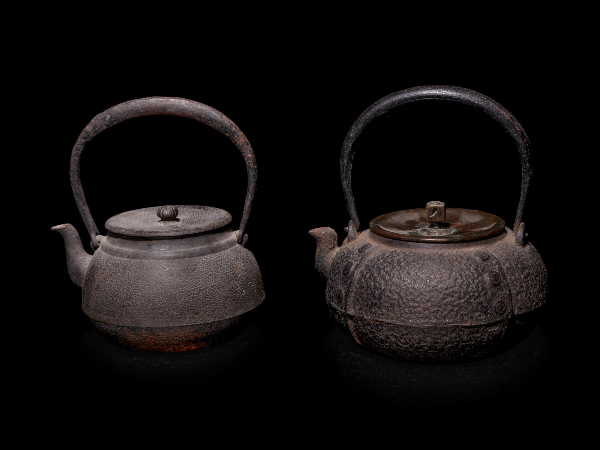 Seven Japanese Cast Iron Teapots, Tetsubin, and Burner