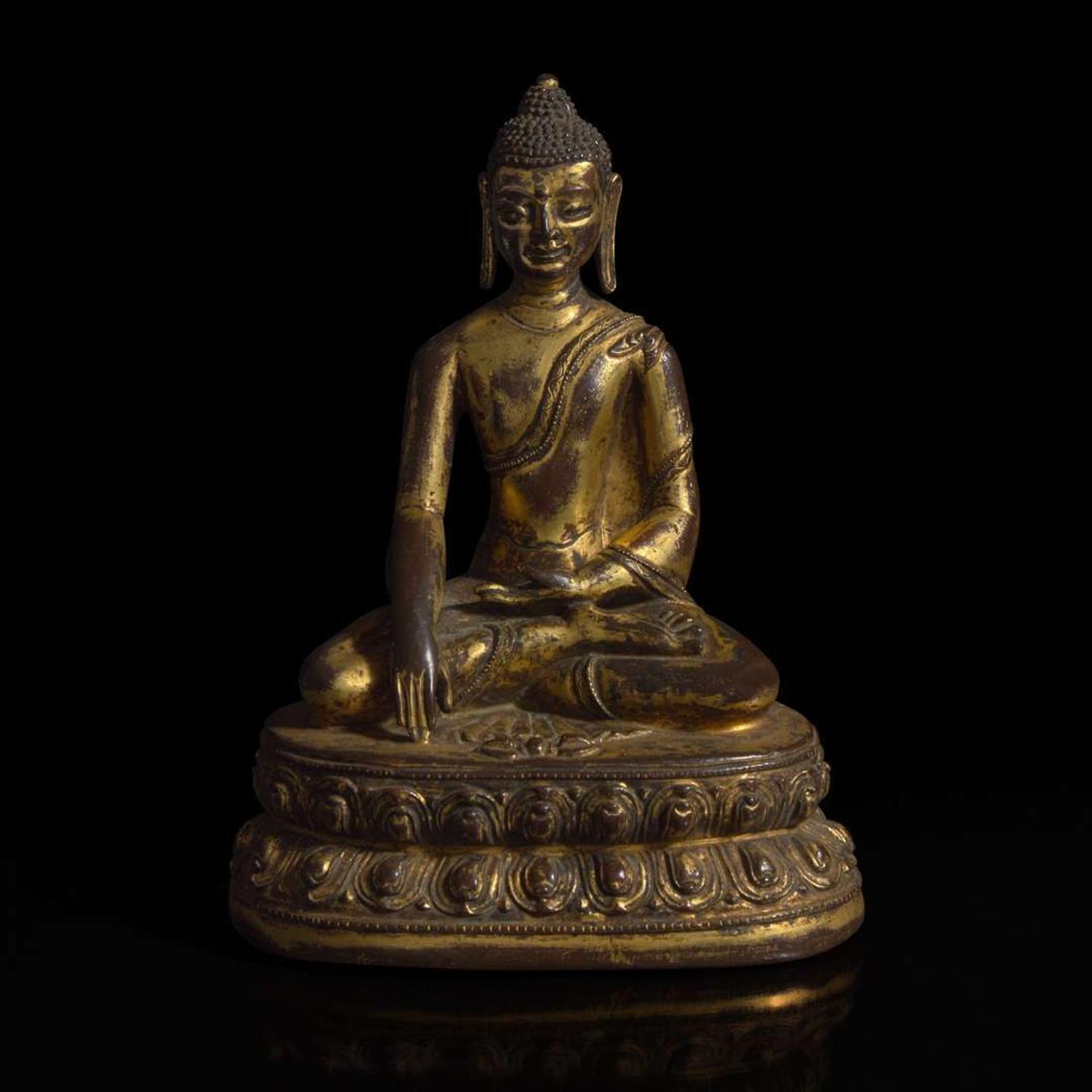 A Himalayan gilt copper alloy figure of Buddha Akshobhya 喜马拉雅铜鎏金阿閦佛造像 14th Century or earlier ???????