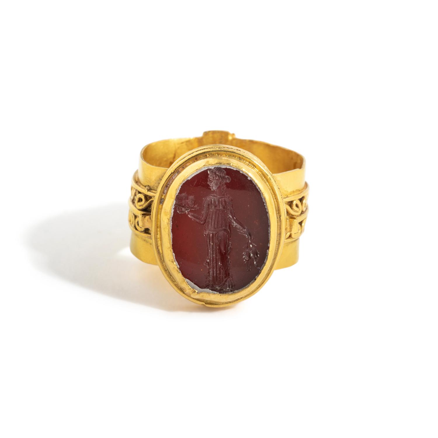A Roman Carnelian Ring Stone with the Goddess Ceres — Set in a gold ring