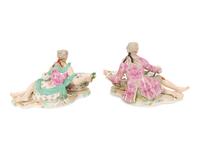 A Pair of German Porcelain Figural Sweetmeat Baskets