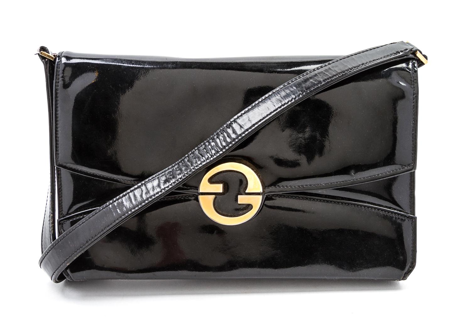 A Gucci Black Vinyl Convertible Bag, 11 1/2 x 10 1/2 x 5 inches.
