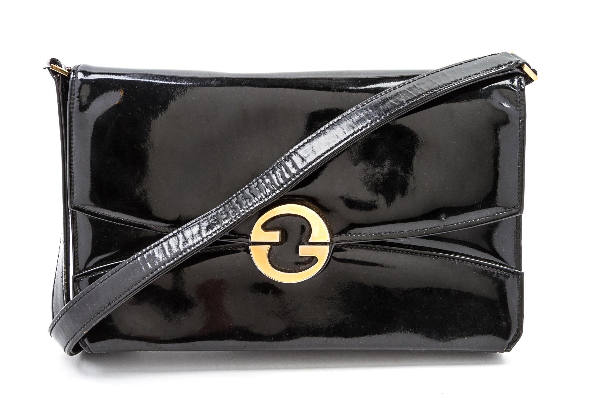 A Gucci Black Vinyl Convertible Bag, 11 1/2 x 10 1/2 x 5 inches.