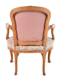 A Louis XV Carved Fruitwood Fauteuil