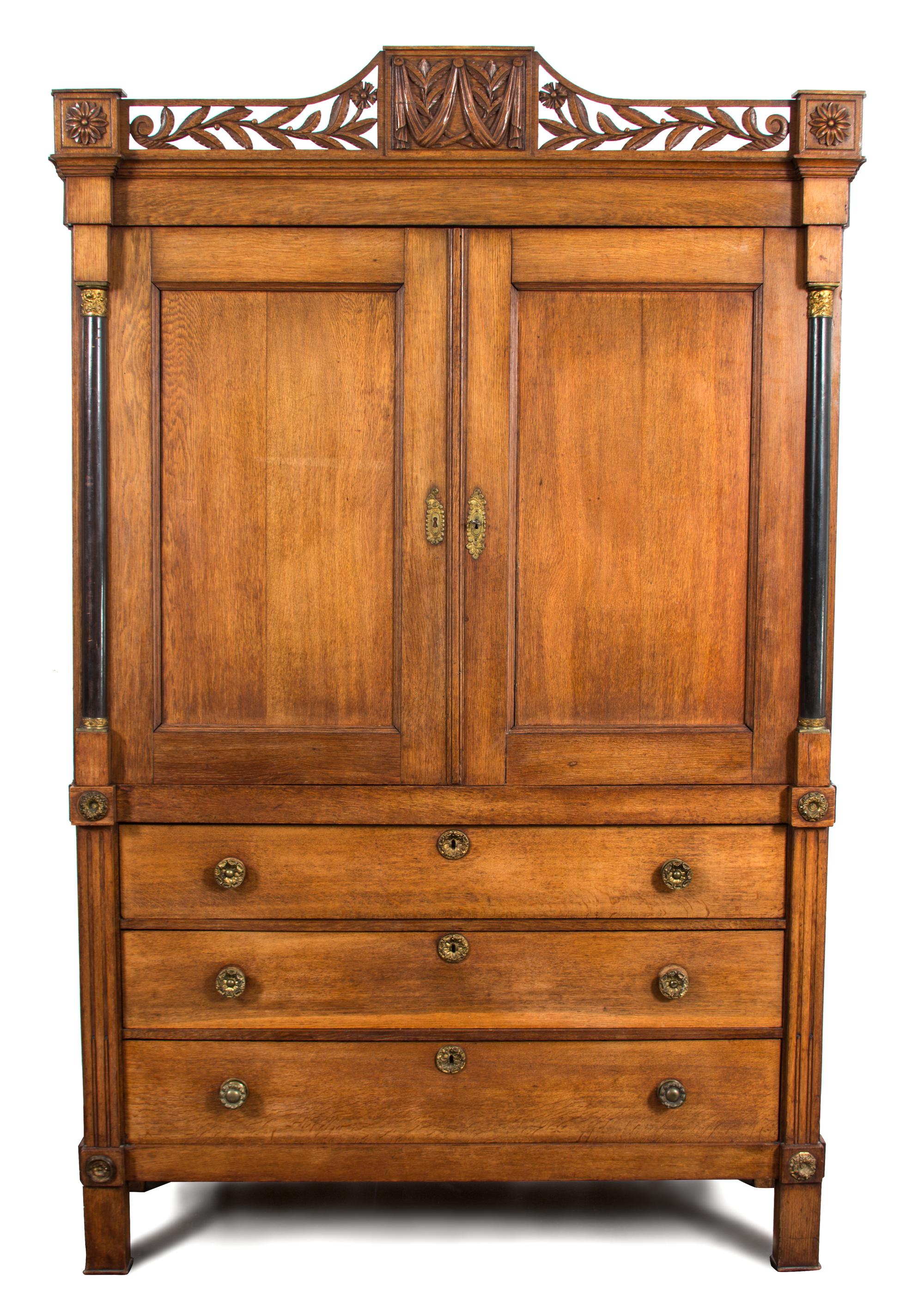 A Louis Philippe Style Carved Oak Armoire Height 90 x width 57 x depth 21 inches. — 19TH CENTURY