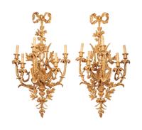 A Set of Four Louis XVI Style Gilt Bronze Five-Light Scones