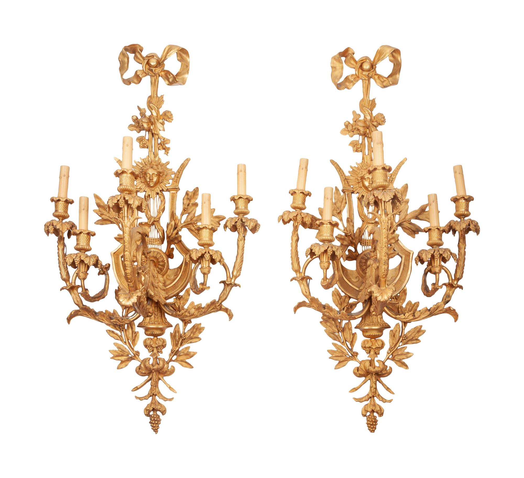 A Set of Four Louis XVI Style Gilt Bronze Five-Light Scones