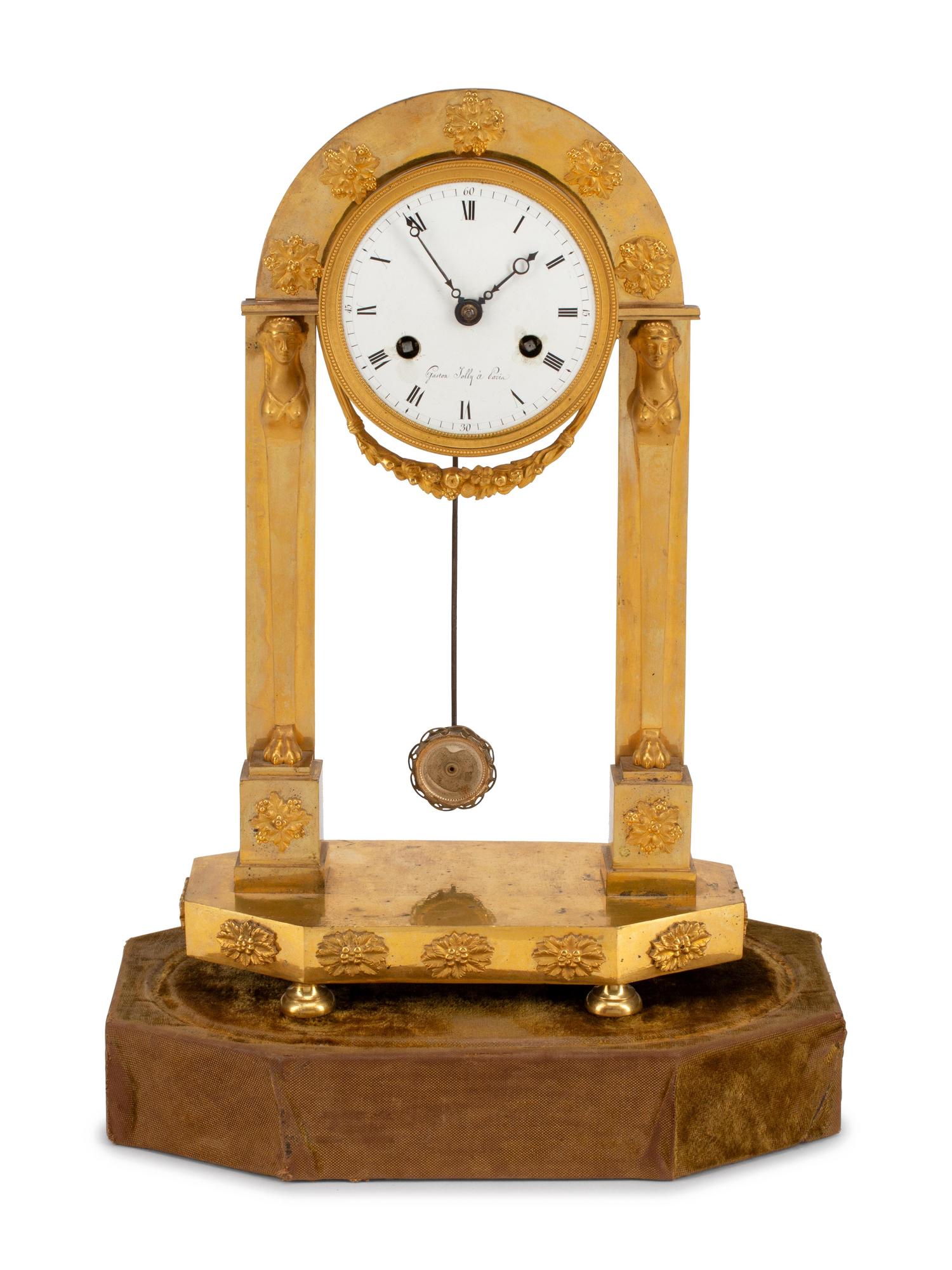 An Empire Gilt Bronze Mantel Clock