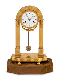 An Empire Gilt Bronze Mantel Clock
