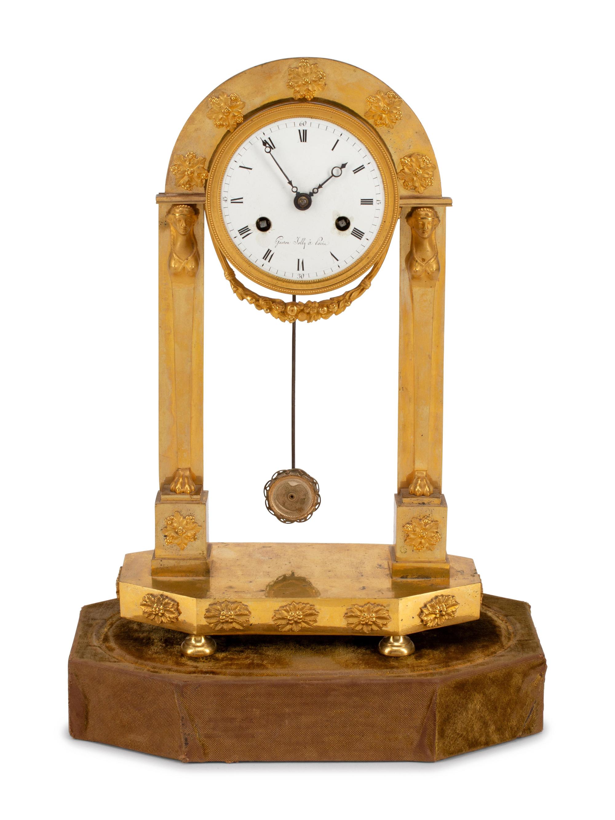 An Empire Gilt Bronze Mantel Clock