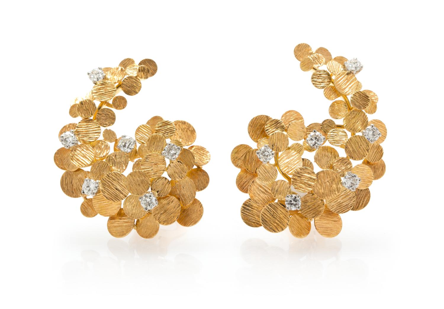 A Pair of 18 Karat Yellow Gold and Diamond Earclips, 12.70 dwts.