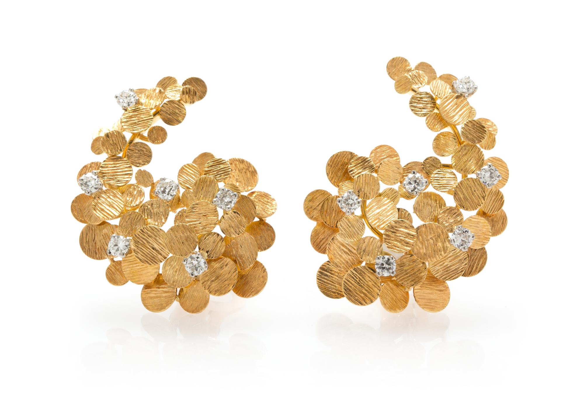 A Pair of 18 Karat Yellow Gold and Diamond Earclips, 12.70 dwts.