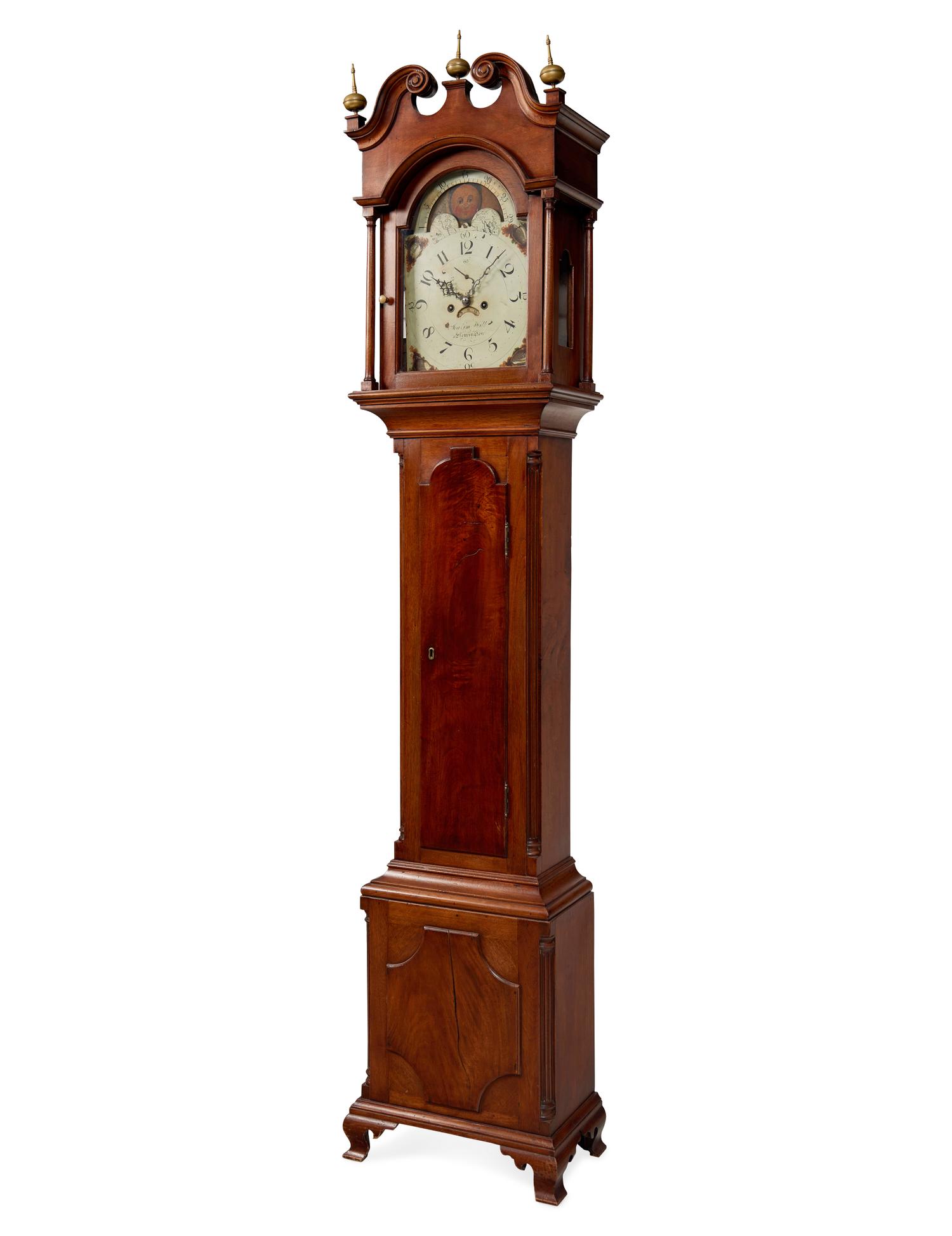 A Federal Carved Walnut Tall Case Clock