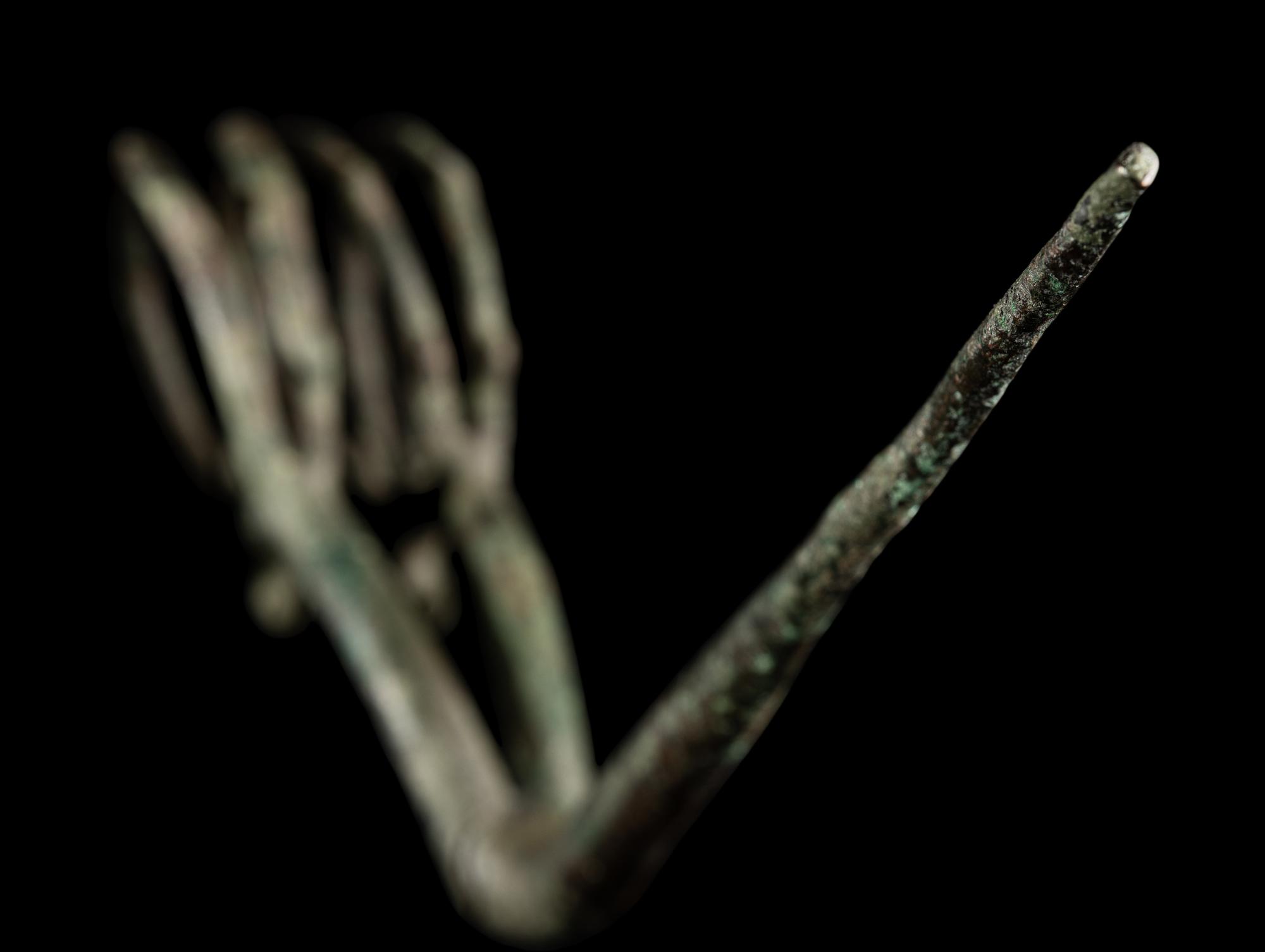 A Luristan Bronze Ibex Fibula