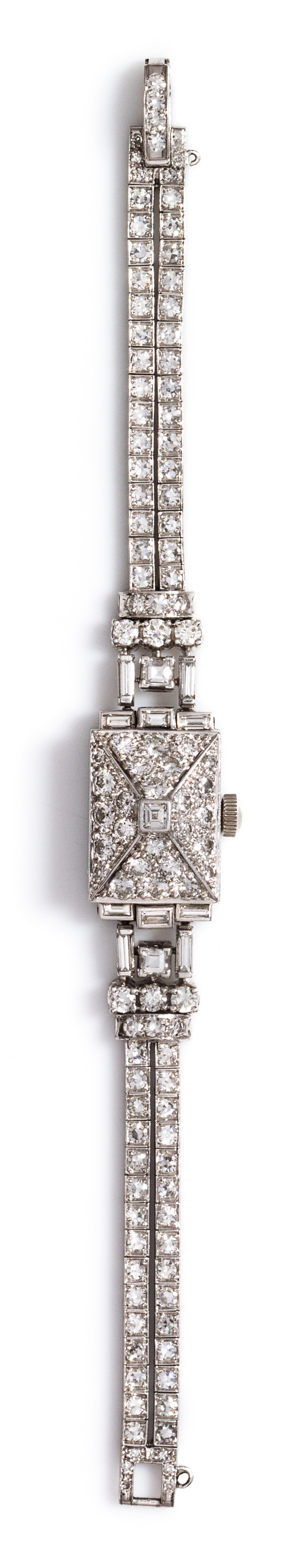 A Platinum and Diamond Surprise Wristwatch, Oscar Heyman Brothers, 23.40 dwts.