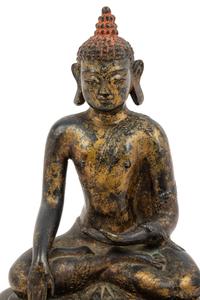A Large Nepalese Gilt Bronze Figure of Seated Buddha