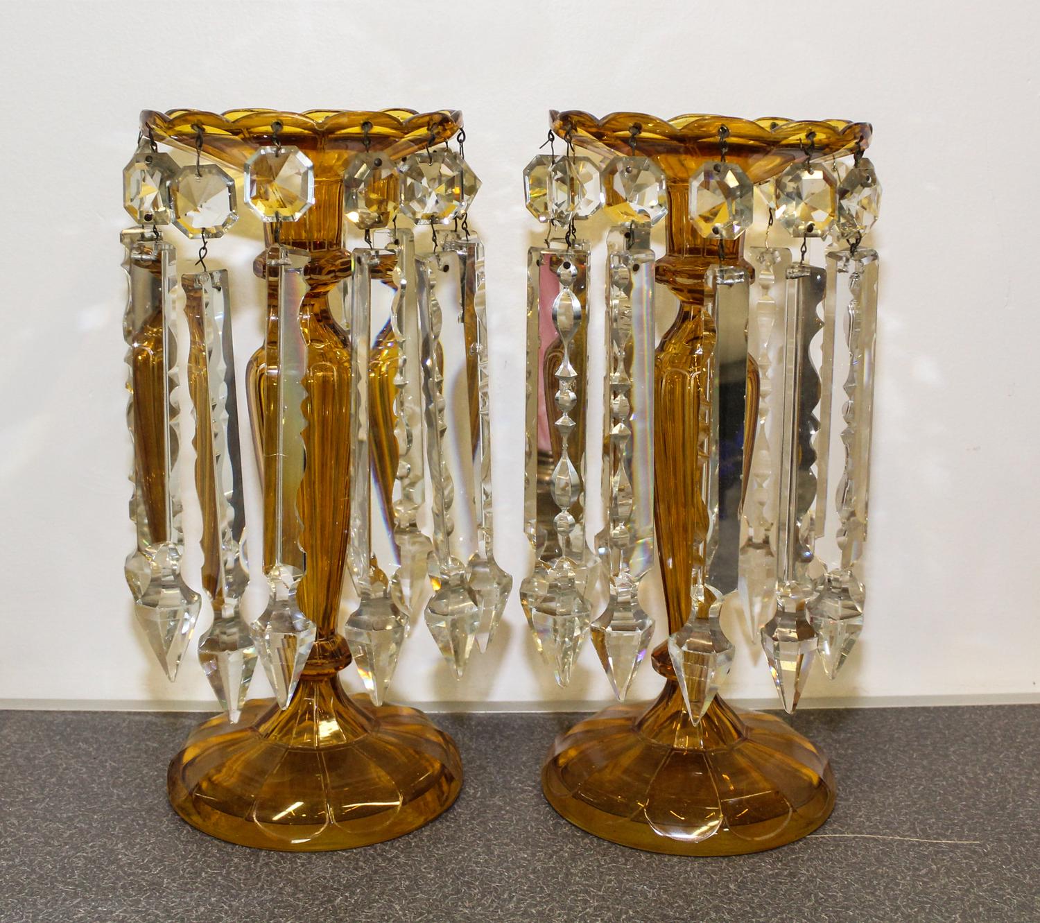 A Pair of Amber Bohemian Glass Mantle Lustres. Height of 12 3/8 inches.