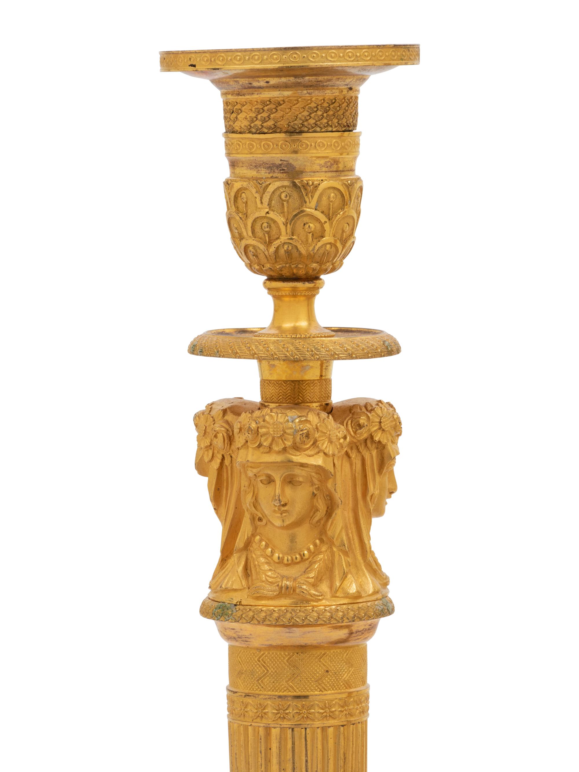 A Pair of Empire Gilt Bronze Candlesticks