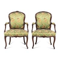 A Pair of Louis XV Style Carved Mahogany Armchairs