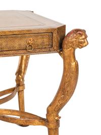 A Regency Style Gilt Metal and Leather Veneered Desk