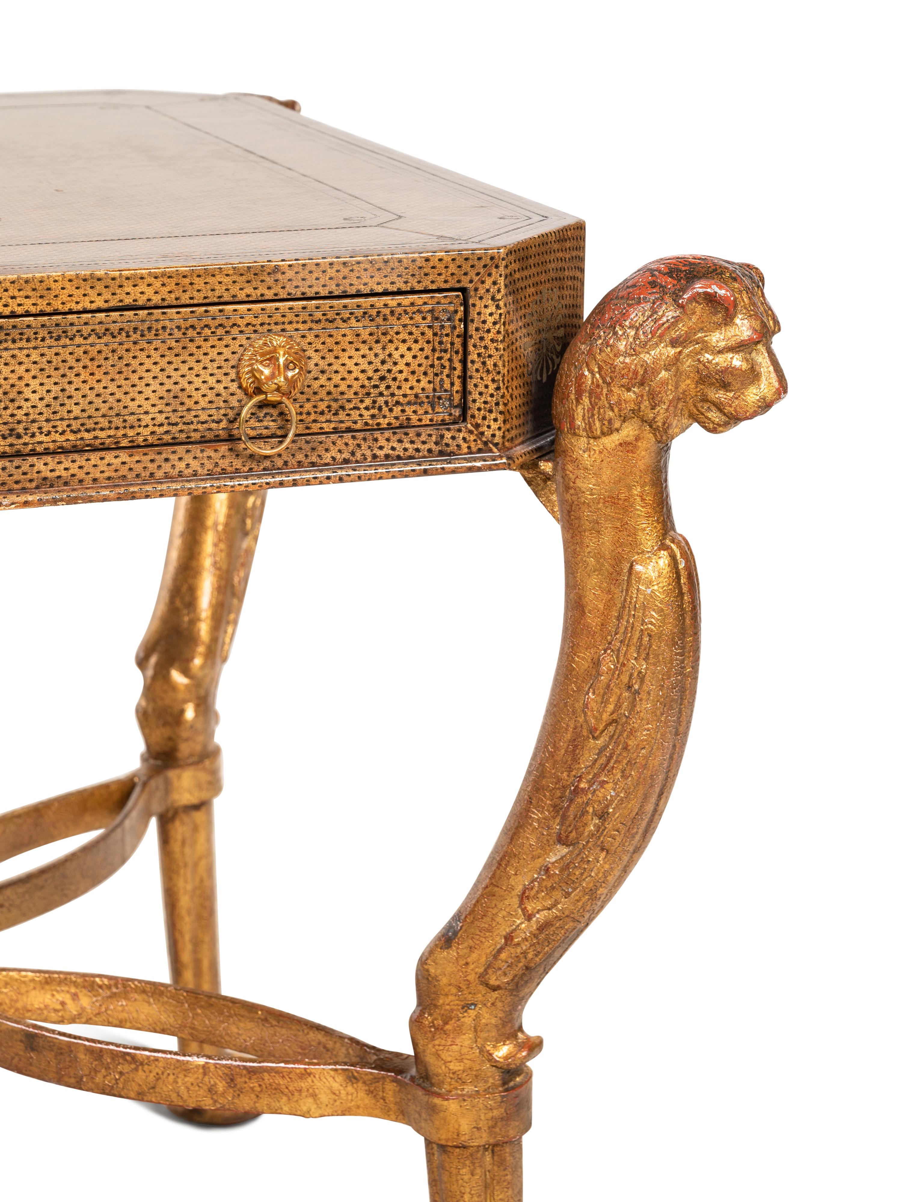 A Regency Style Gilt Metal and Leather Veneered Desk